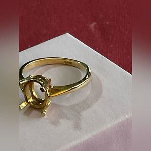 10K ring, without gem, size 5 ring.